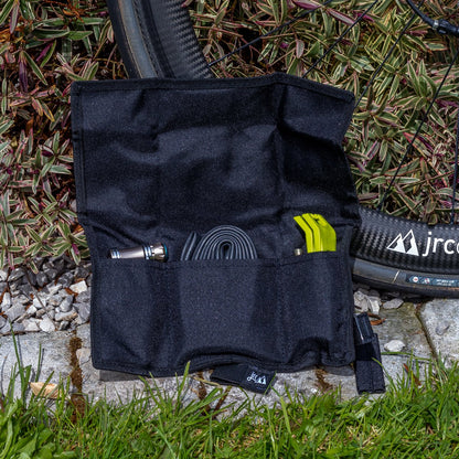 Compact and lightweight bicycle multi-tool with Hex wrenchs, screwdrivers,Torx heads and CO2 inflator, in a saddle bag