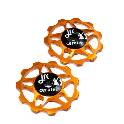 Orange, lightweight aluminium 11 tooth pulley wheel set for bicycles, for Shimano SRAM and Campagnolo