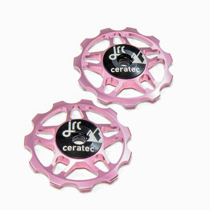 Pink, lightweight aluminium 11 tooth pulley wheel set for bicycles, for Shimano SRAM and Campagnolo