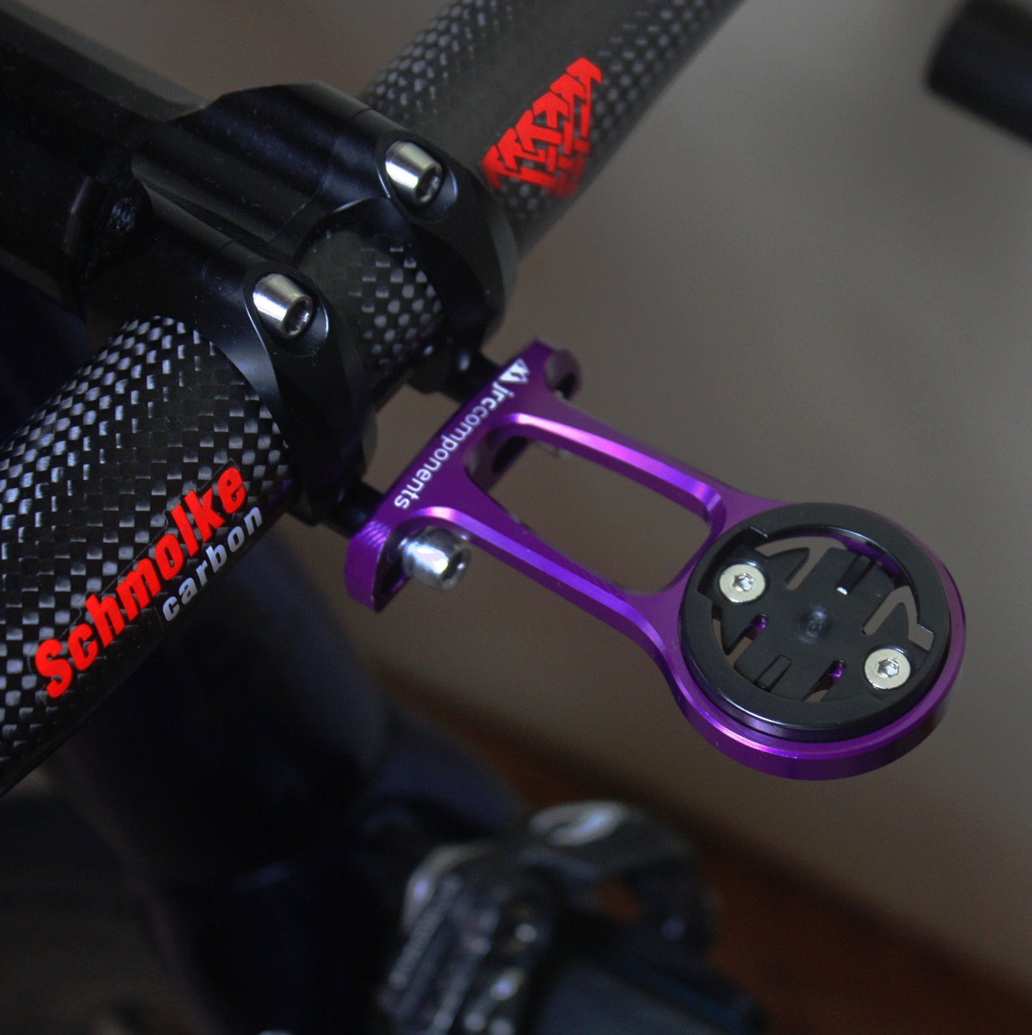 Purple, lightweight aluminium stem out front GPS computer mount, fitted to bicycle