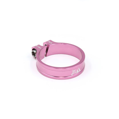Pink, lightweight bicycle seat post clamp with titanium bolt and white etching.