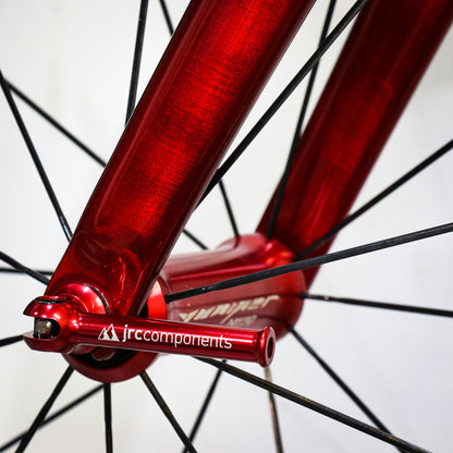 JRC Lightweight Bicycle Components Quick Release Skewers With Titanium Axel And Oversized  Hollowed Anodised Levers Set Fitted In Red