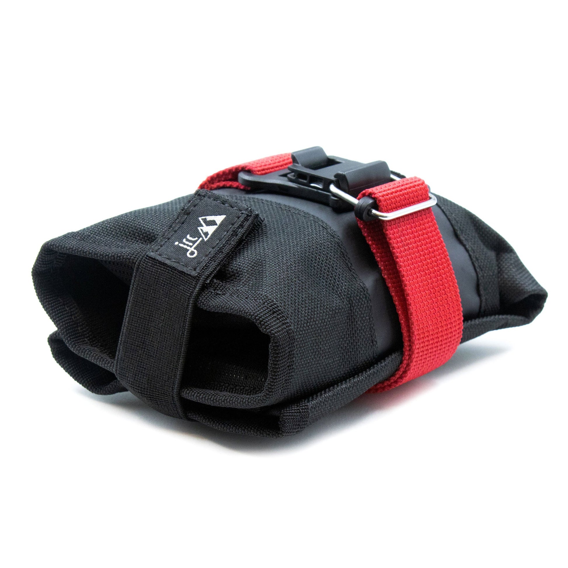 Bicycle saddle roll bag. Compact design with elasticated band and magnetic Fidlock clasp on red strap