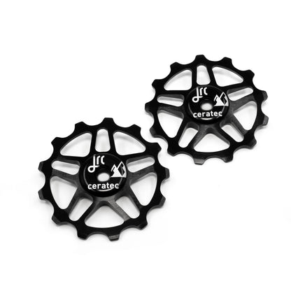 Black, lightweight aluminium pulley wheel set for bicycle, compatible with 13 tooth Shimano 12 speed
